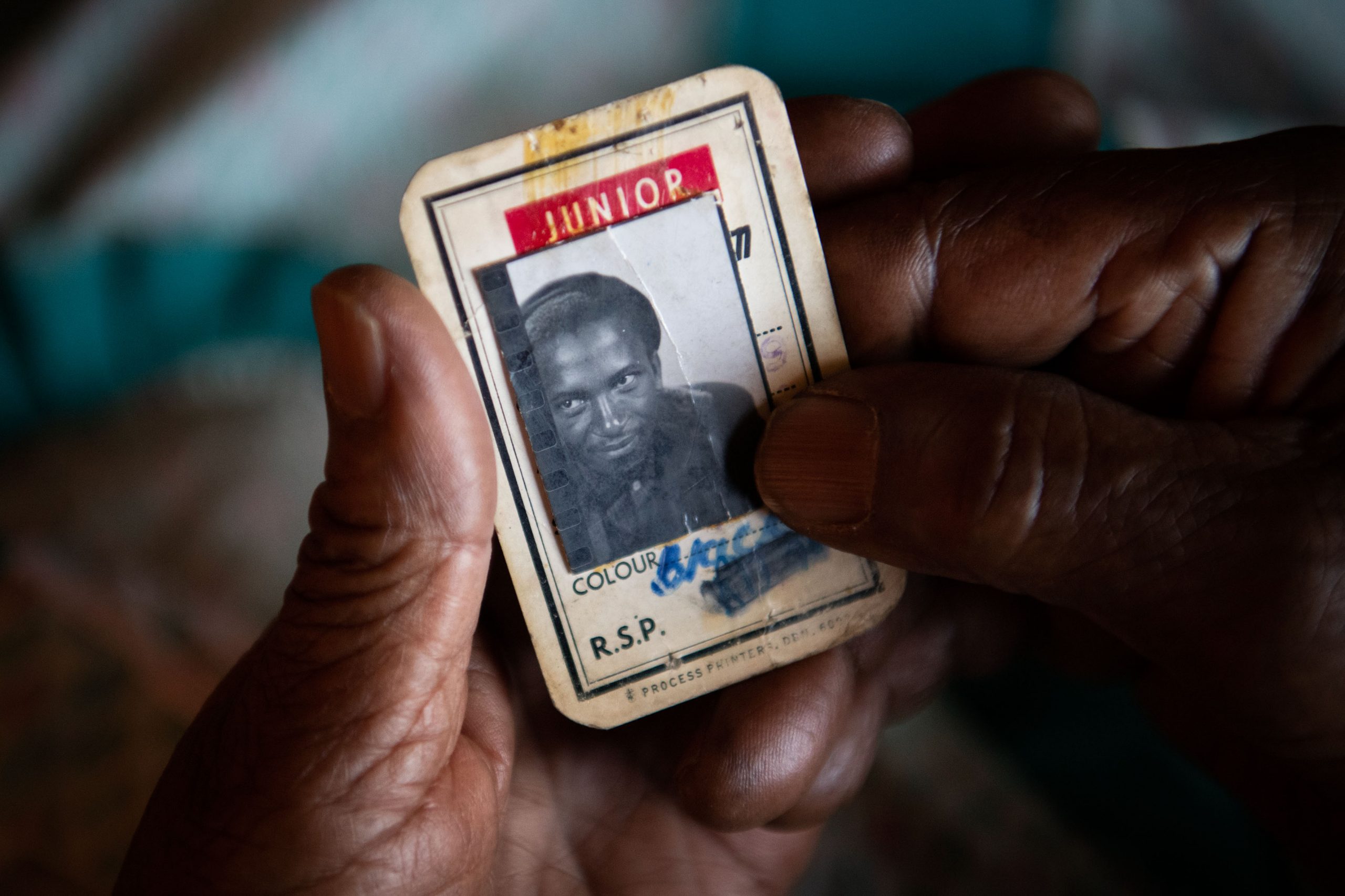 3 December 2019: Catherine Hlatshwayo holds an identification card that belonged to Ernest Cole. 