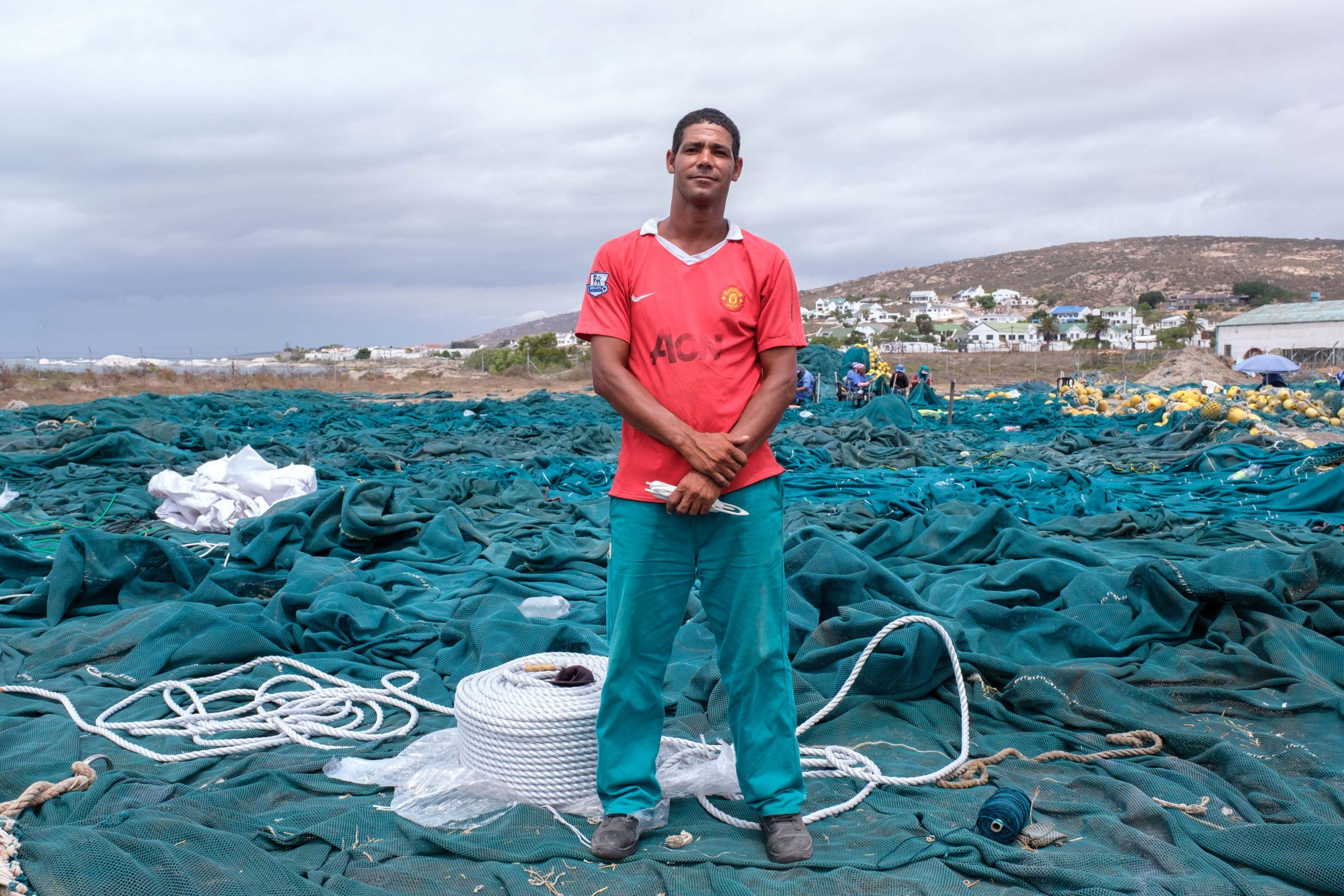 22 January 2020: Clinton Gordon standing on one of the nets he has helped repair. 