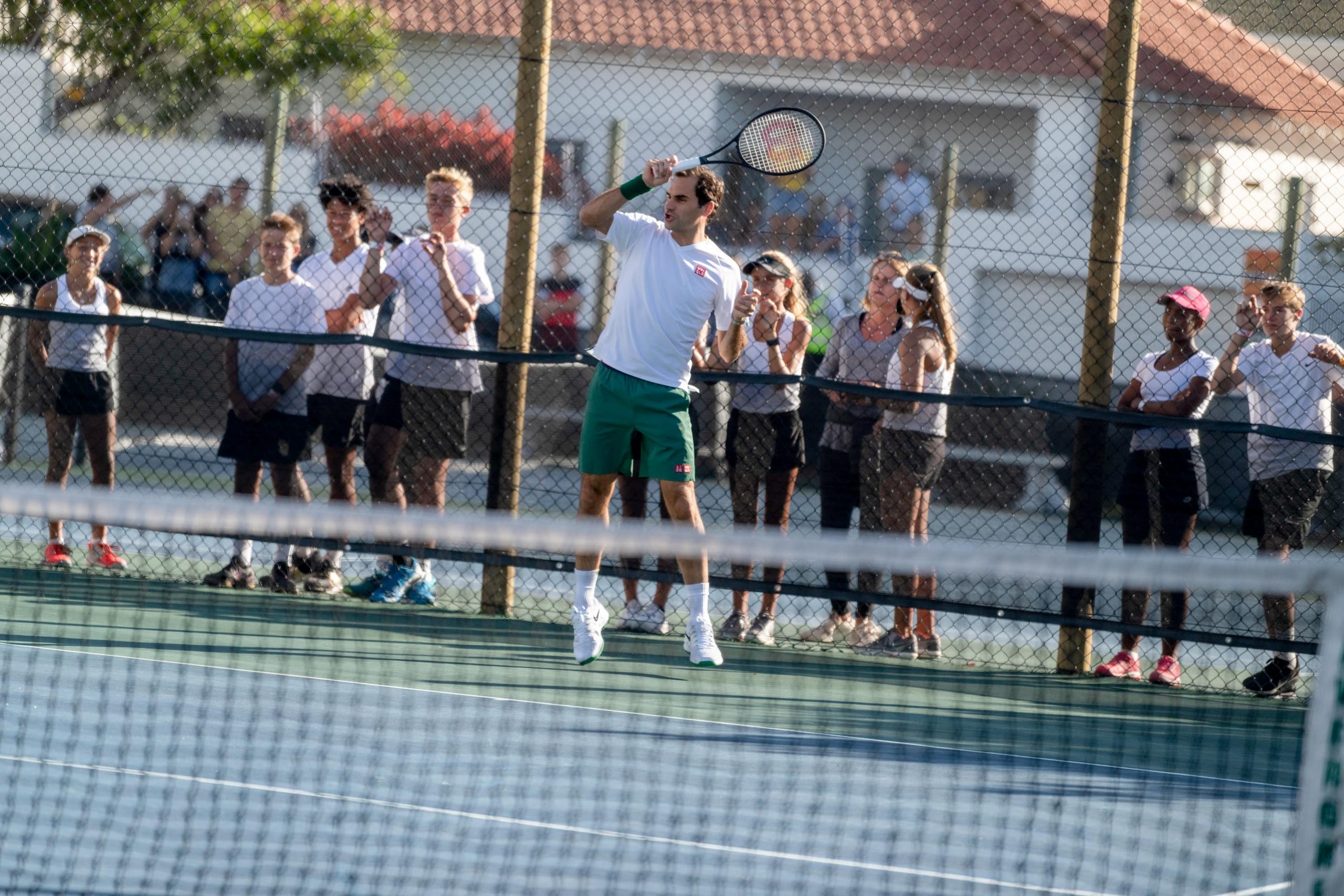 6 February 2020: Young players watch as Roger Federer plays a shot during an event at the Anthony Harris Tennis Academy ahead of Match in Africa 6. (Photograph by Ihsaan Haffejee)