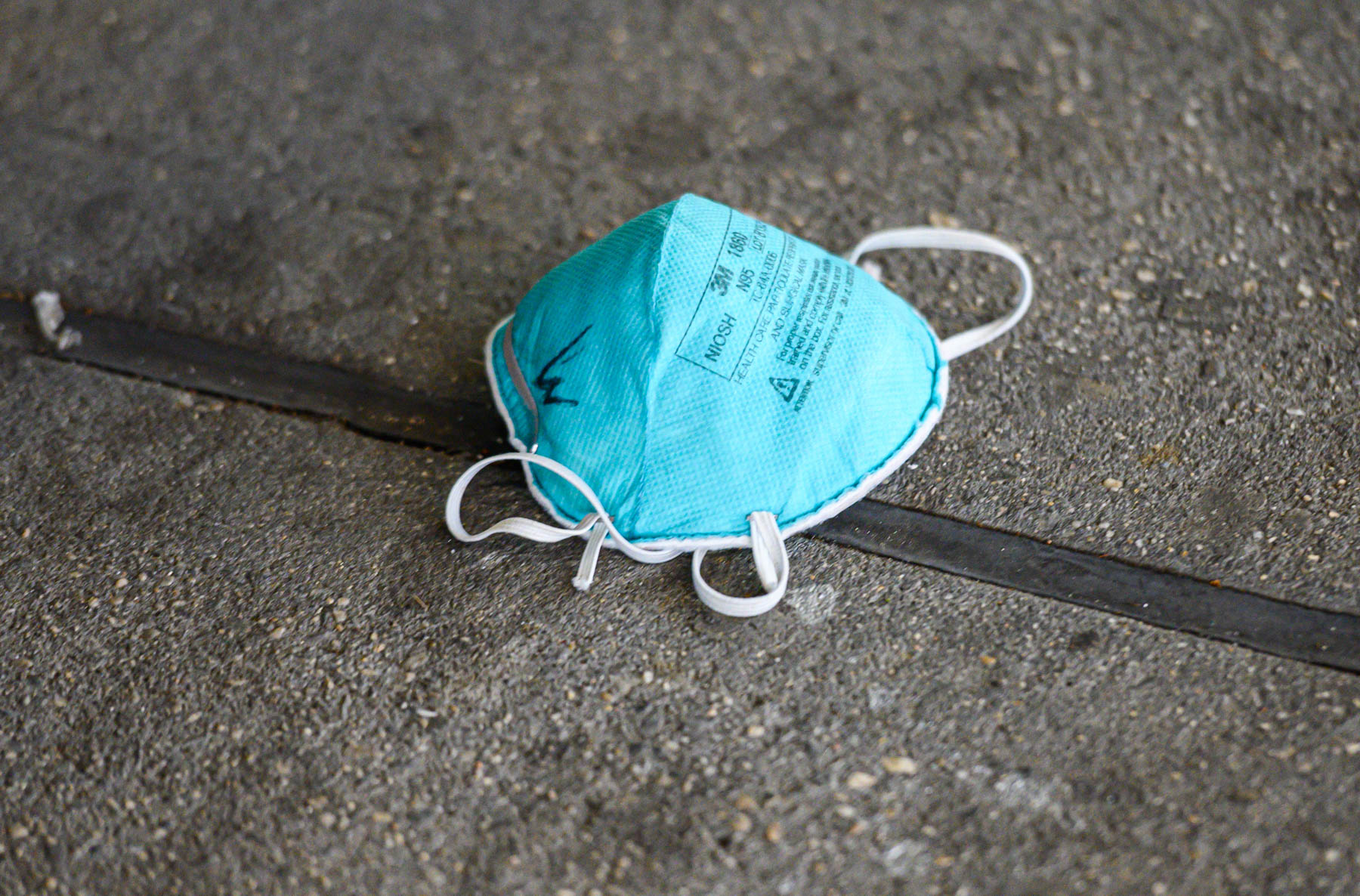 25 April 2020: A view of an N95 face mask outside NYU Langone Health hospital in New York City. At one stage, nurses in the city were reportedly told to reuse personal protective gear until it became soiled. (Photograph by Noam Galai/ Getty Images)