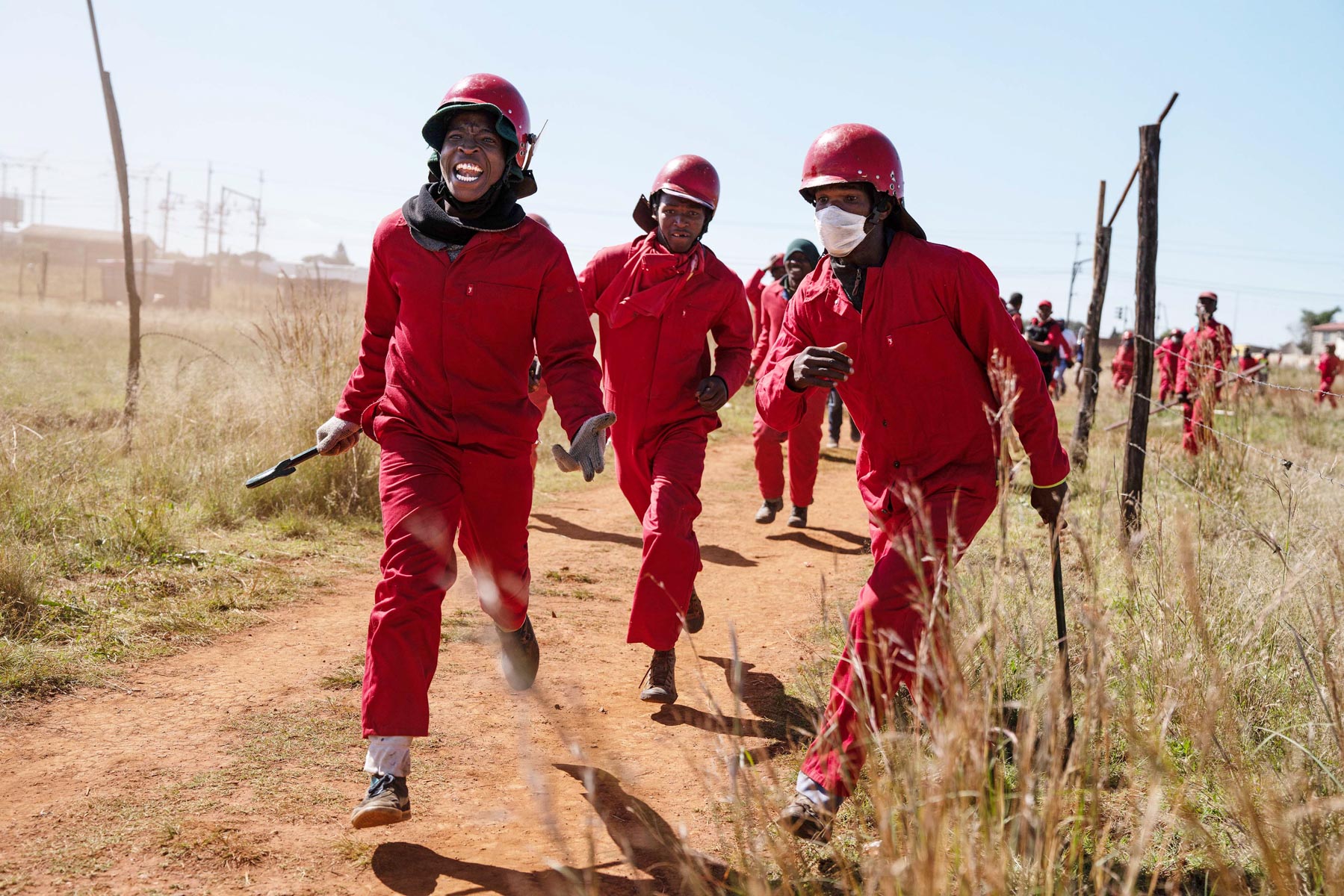 21 April 2020: Red Ants charge at residents during an eviction at the Lakeview shack settlement. (Photograph by James Oatway)