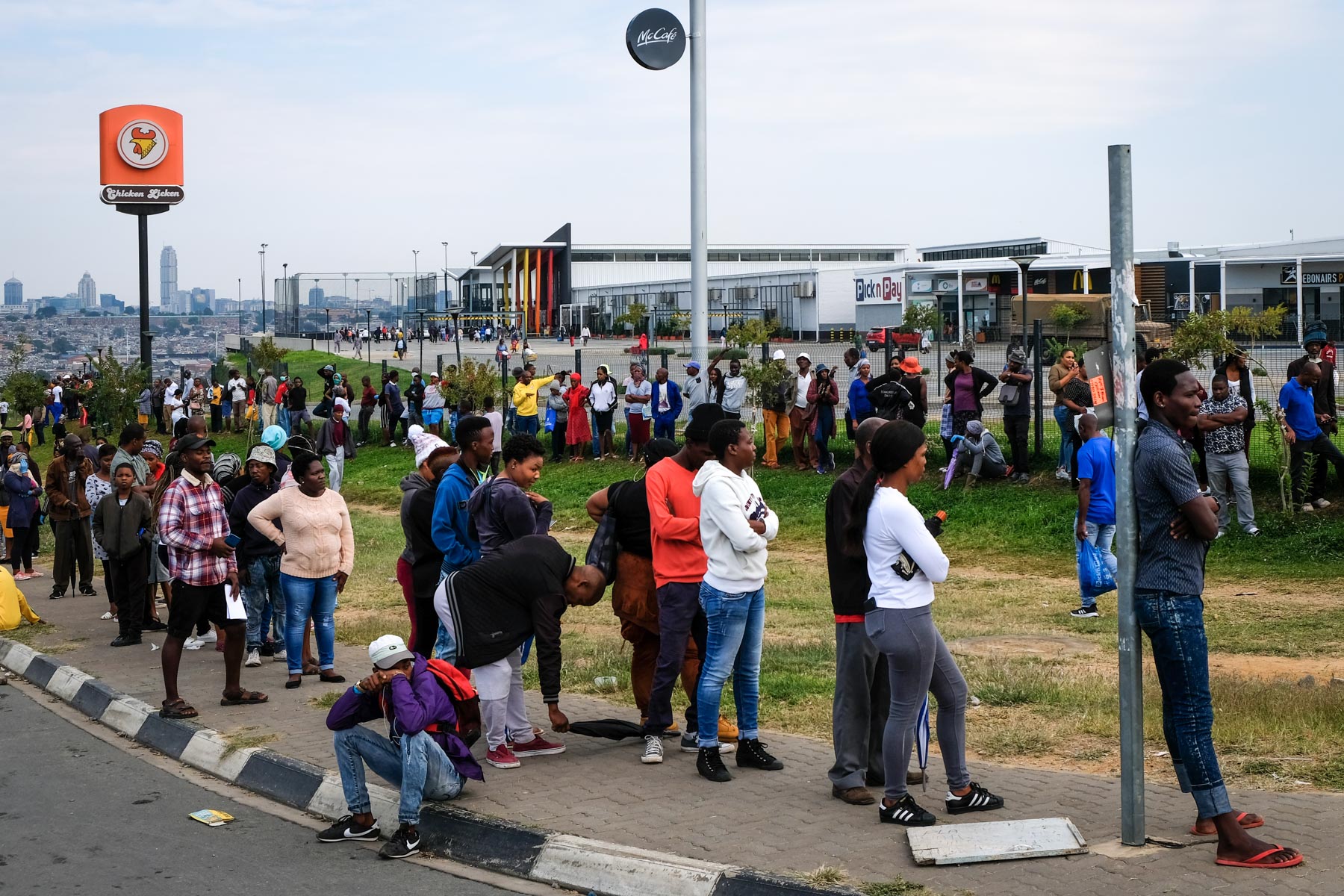 1 April 2020: Residents queue outside the Alex mall. 