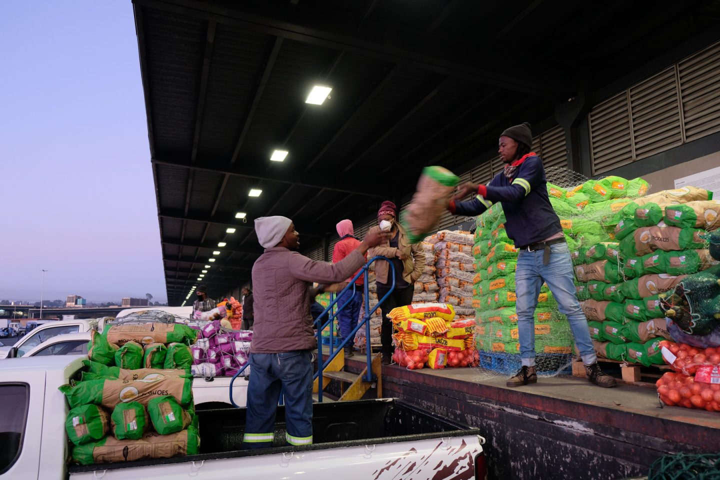 8 May 2020: Potatoes being loaded on the back of a bakkie for sale in Johannesburg’s informal food economy.