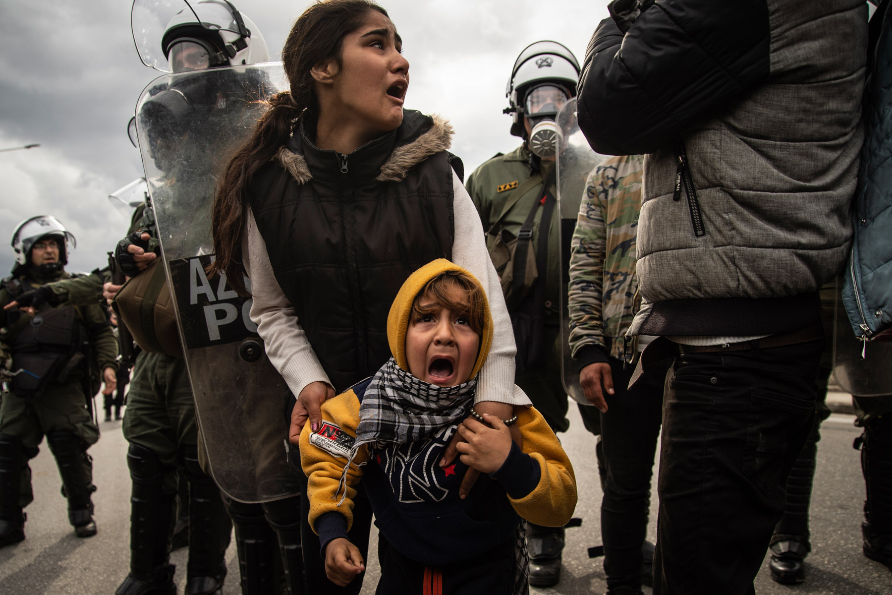 3 February 2020: Clashes break out between refugees and anti-riot police on the Greek island of Lesbos as the former protest against the conditions in which they have to live at the Moria refugee camp. (Photograph by Ivan Romano/ Getty Images)