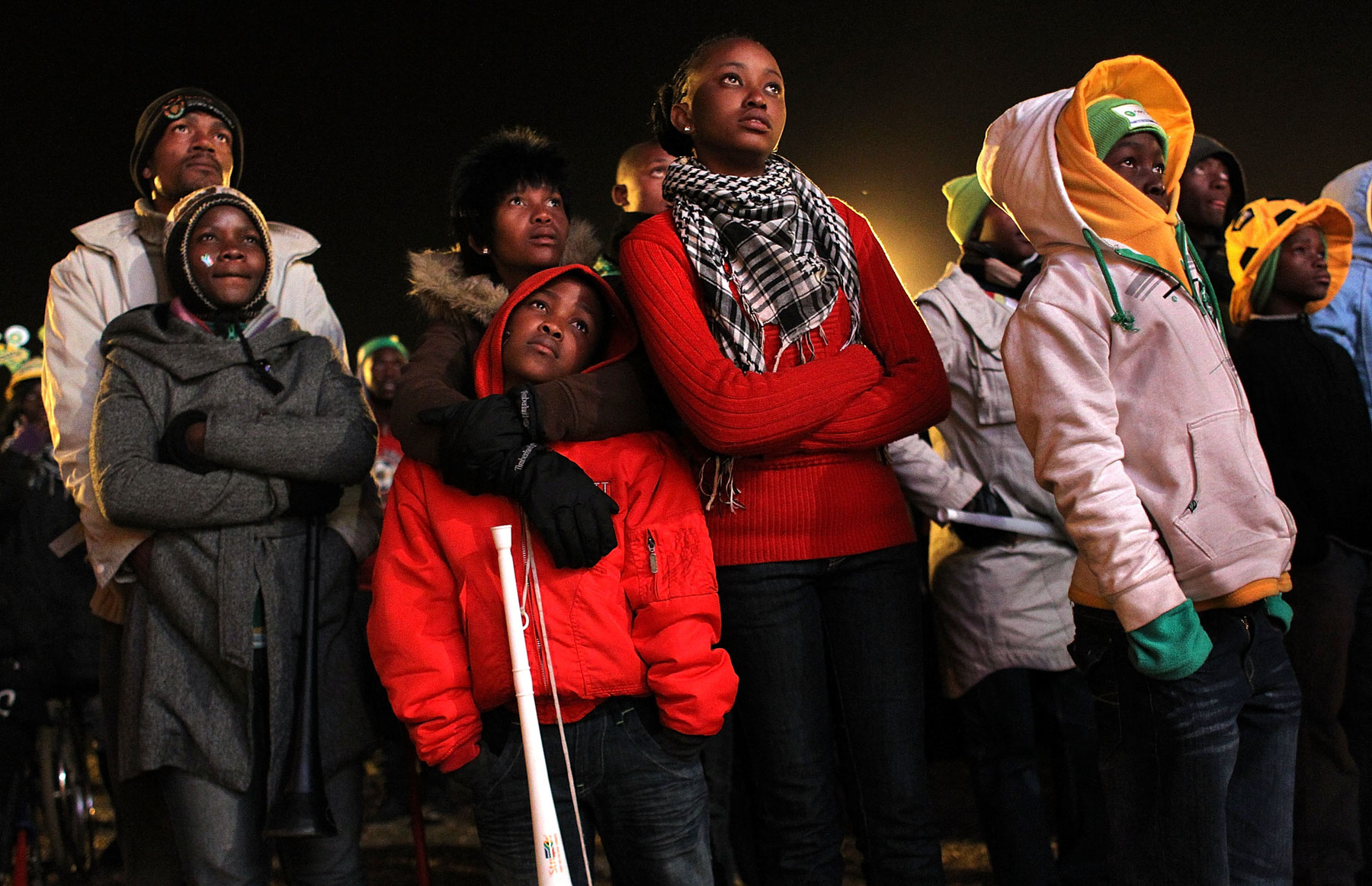 16 June 2010: Spectators at a Soweto fan park watch as Uruguay defeats South Africa 3-0. (Photograph by John Moore/ Getty Images)