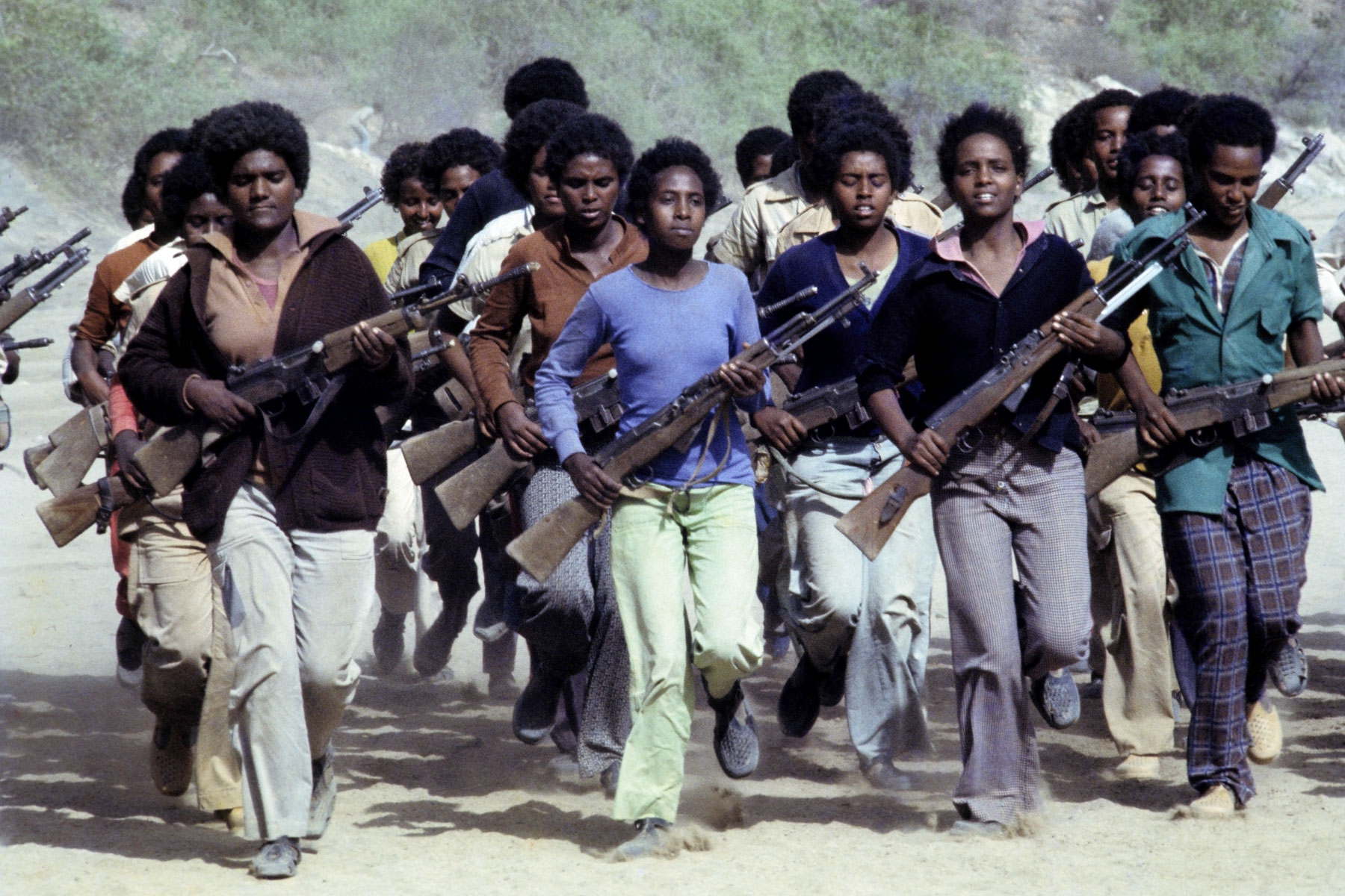 18 June 1978: Young men and women undergo military training at an Eritrean People’s Liberation Front camp in the mountains of northern Eritrea in Ethiopia. (Photograph by Alex Bowie/ Getty Images)