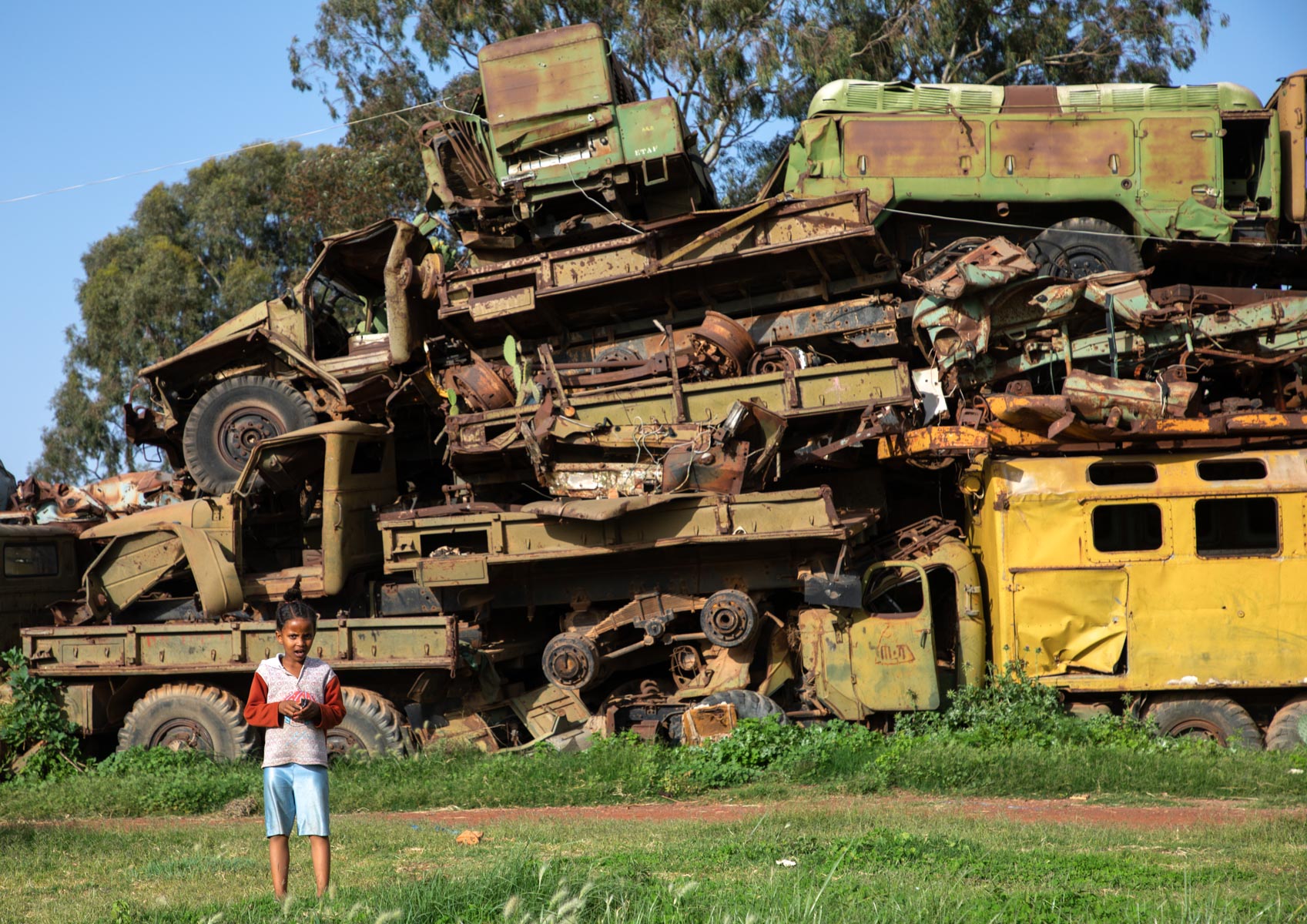 22 August 2019: An Eritrean child plays in the military vehicle graveyard in the capital city of Asmara. (Photograph by Eric Lafforgue/ Art in All of Us/ Corbis via Getty Images)