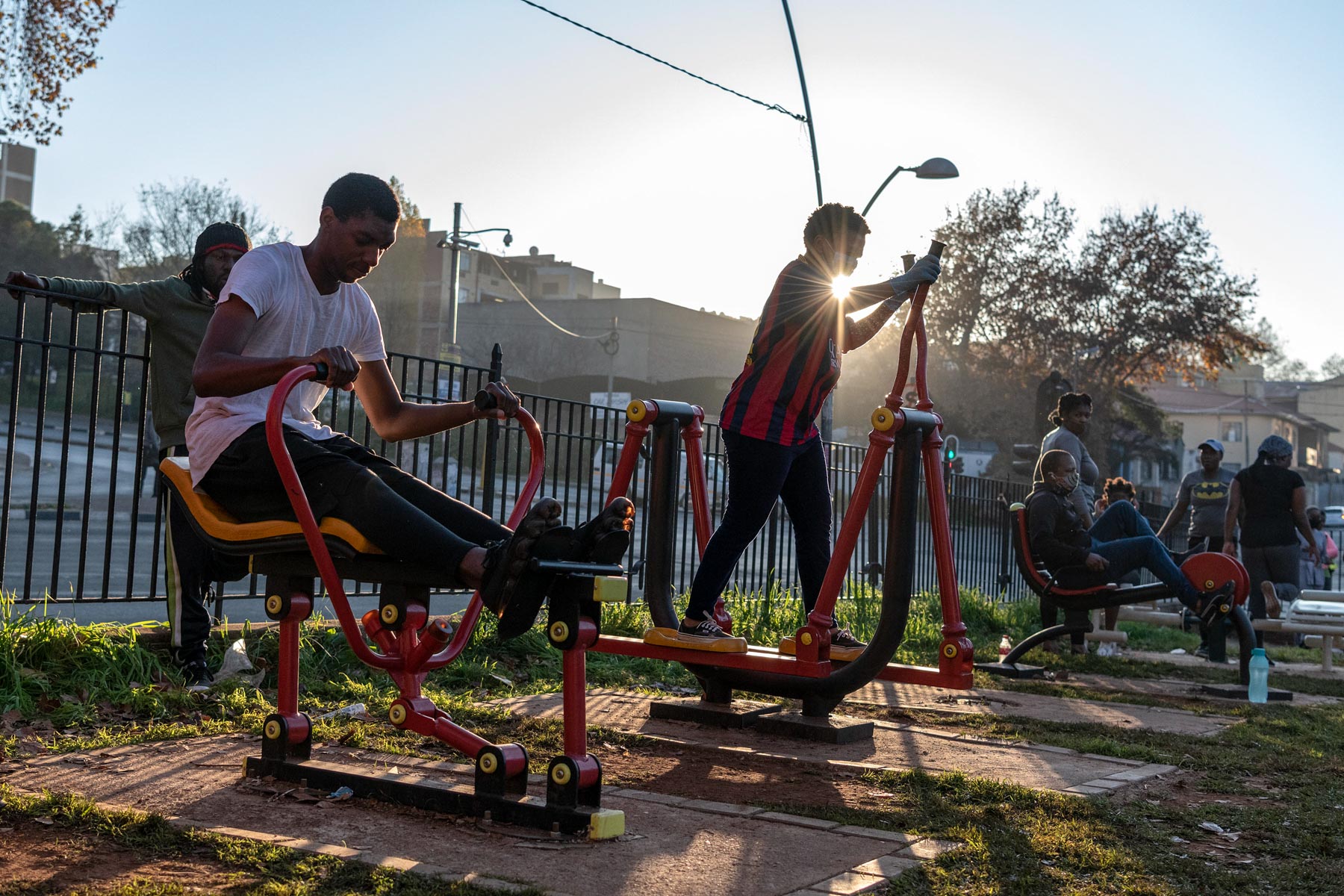 12 May 2020: Residents otherwise stuck inside small flats in the inner city of Johannesburg make use of the outdoor gym facilities during the morning exercise window.