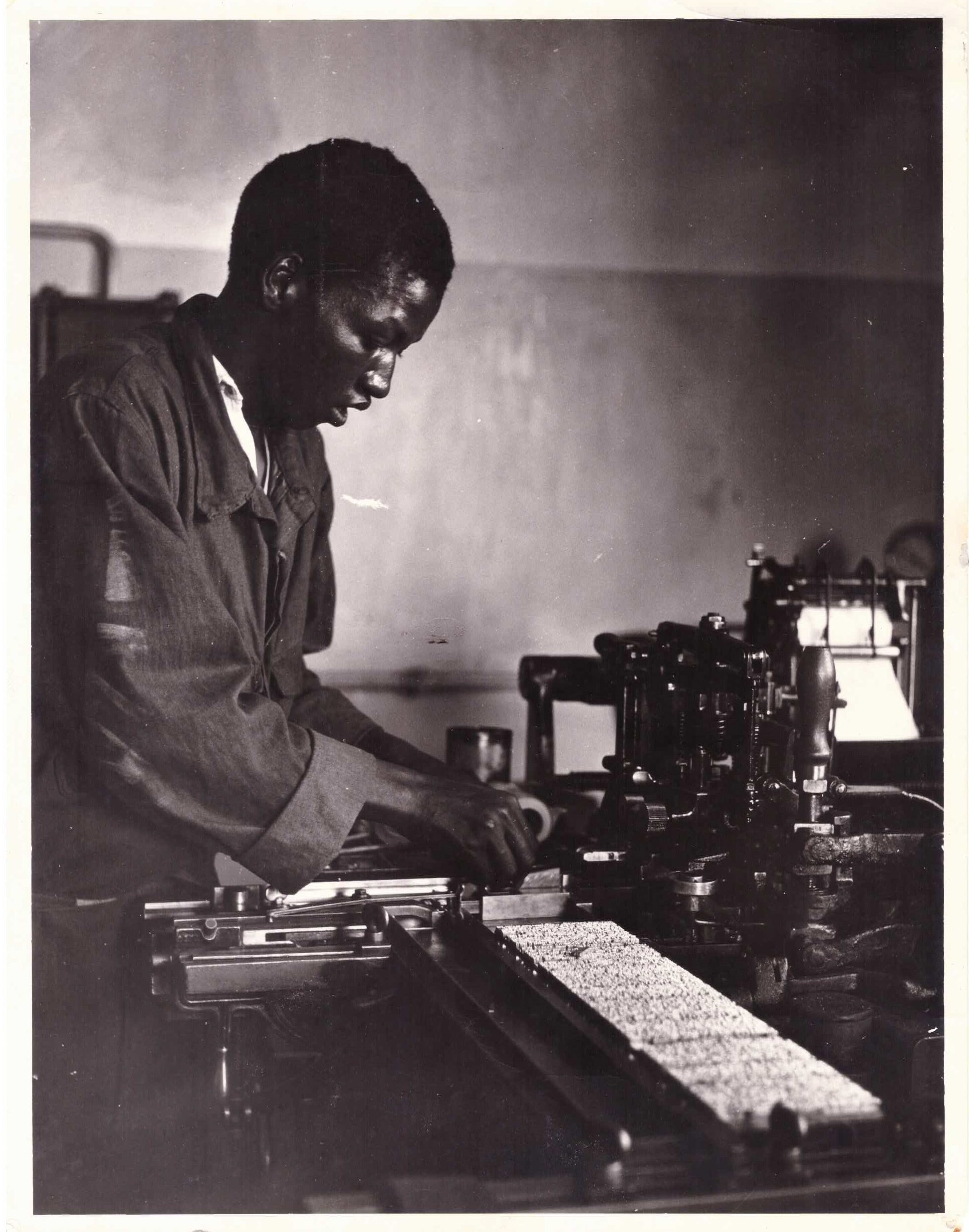 Undated: An unidentified young man setting type at Lovedale Press in readiness for printing. (Image courtesy of Amathole Museum, King William's Town)