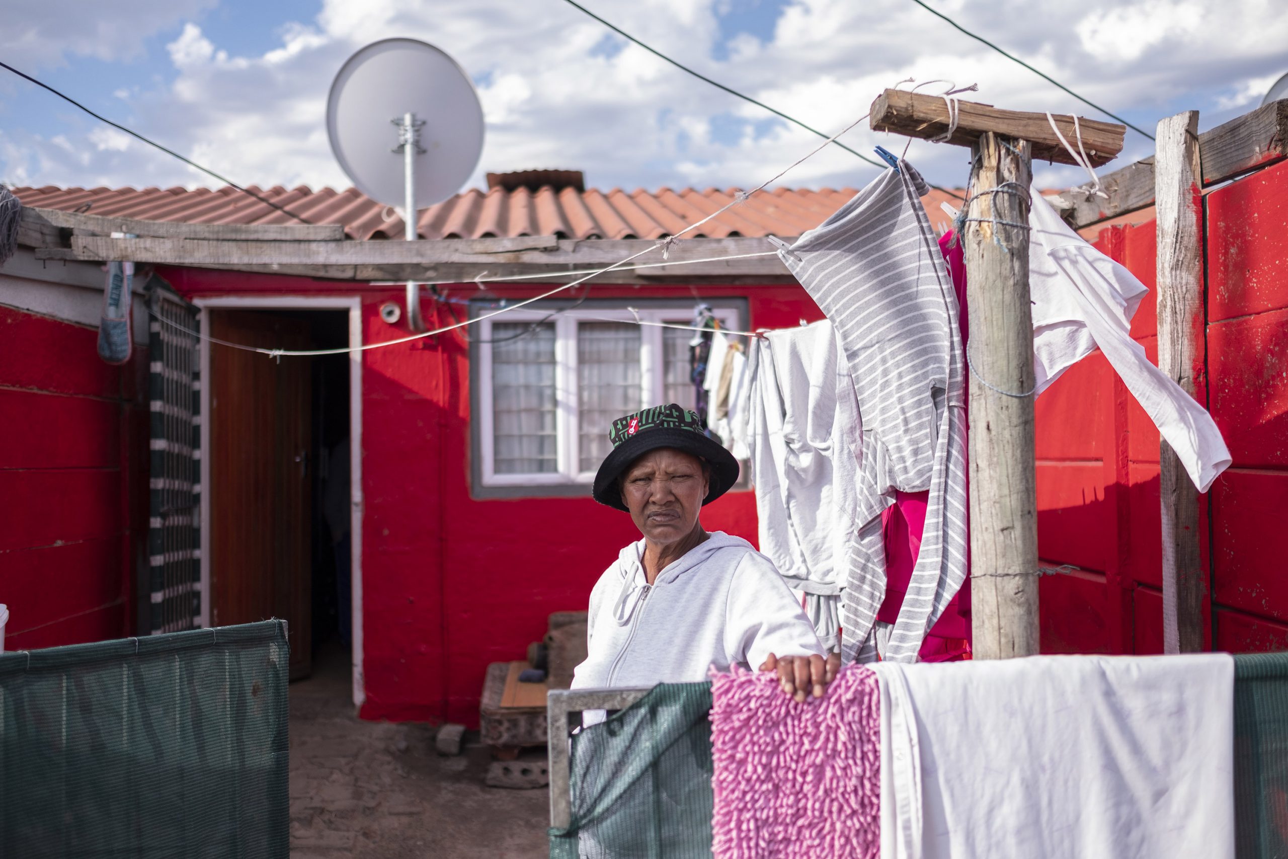 9 June 2020: Cecilia Meintjies stands in the front yard of her home in Uitsig. Petrus Miggels and Meintjies had been together for 20 years and lived in this one-bedroom house.