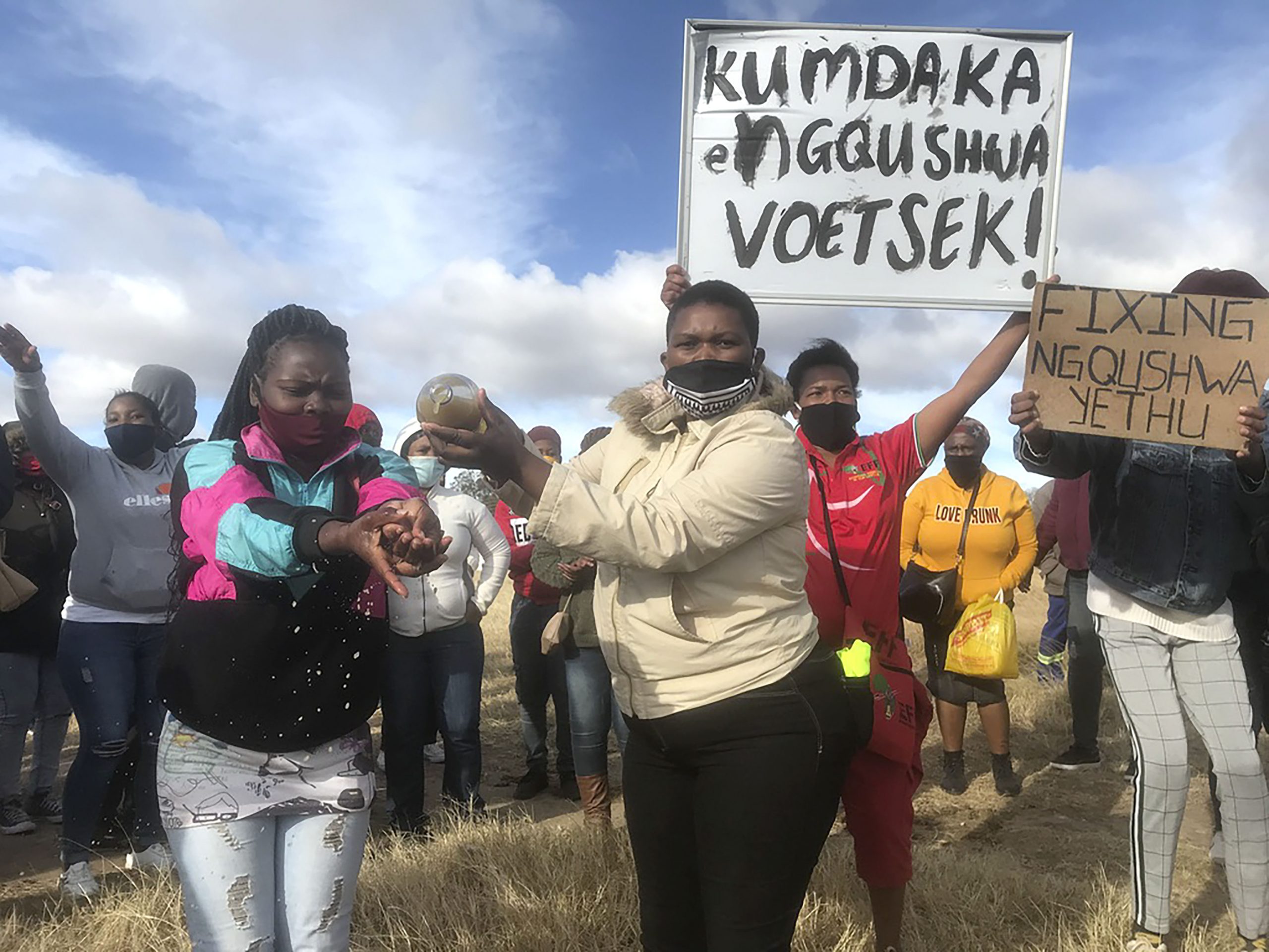 7 July 2020: Activists brought dirty tap water to the protest to show what residents are facing.   