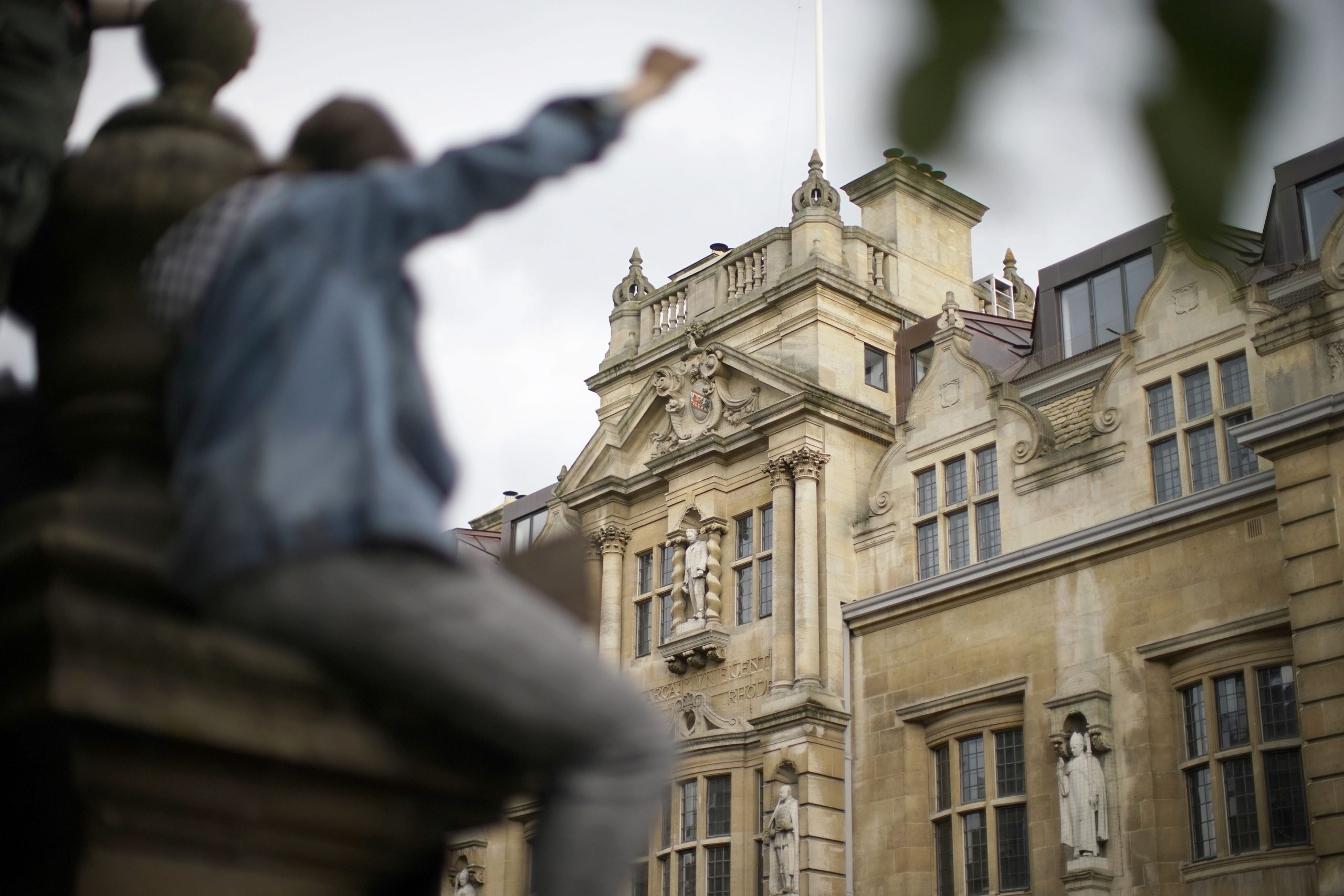 9 June 2020: Demonstrators gather outside University of Oxford’s Oriel College during a protest called by the Rhodes Must Fall campaign in Oxford, England. (Photograph by Christopher Furlong/ Getty Images)