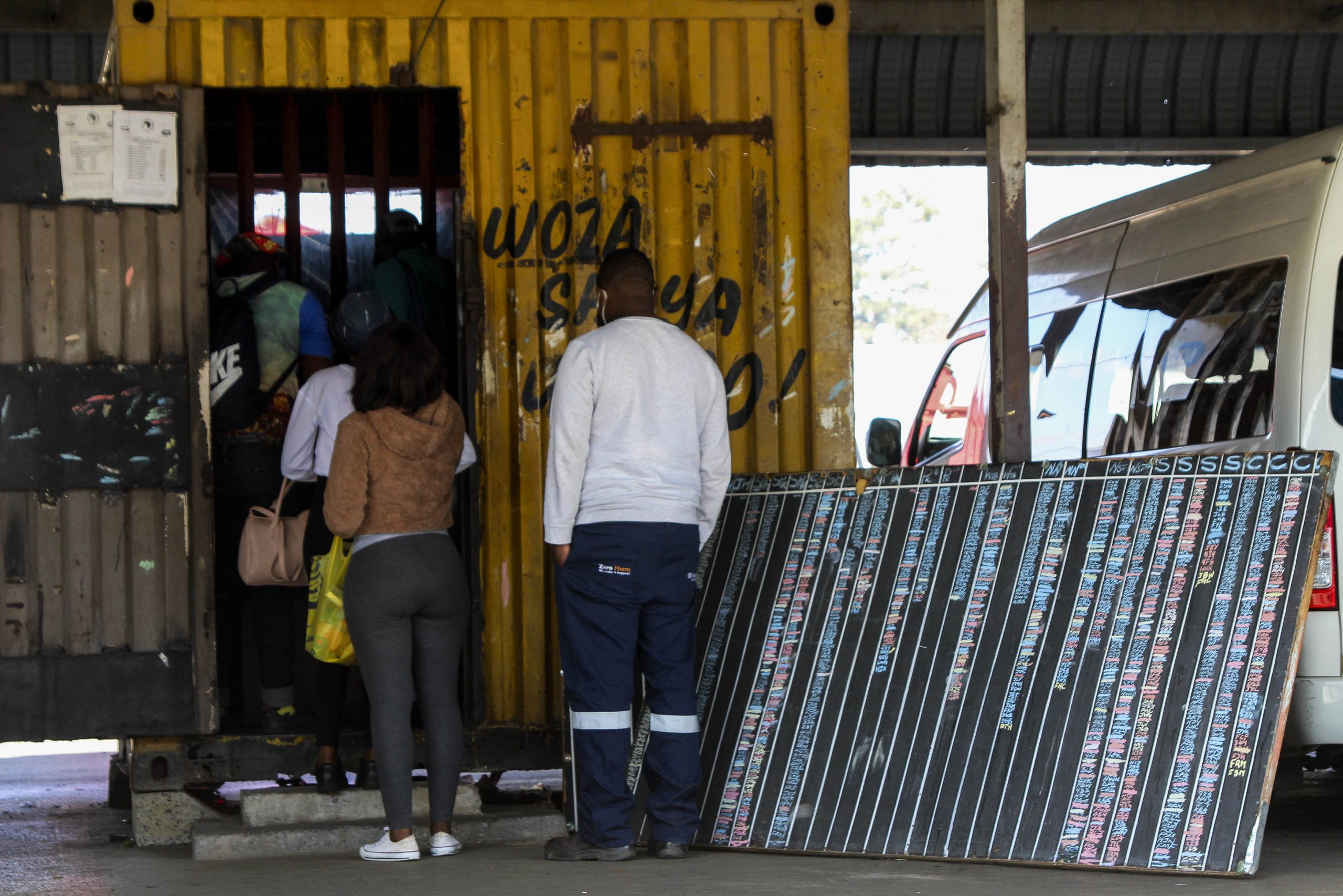 9 June 2020: Passengers queue at the office for long-distance travel in Ermelo, Mpumalanga, to register and pay their fares. (Photograph by Magnificent Mndebele)
