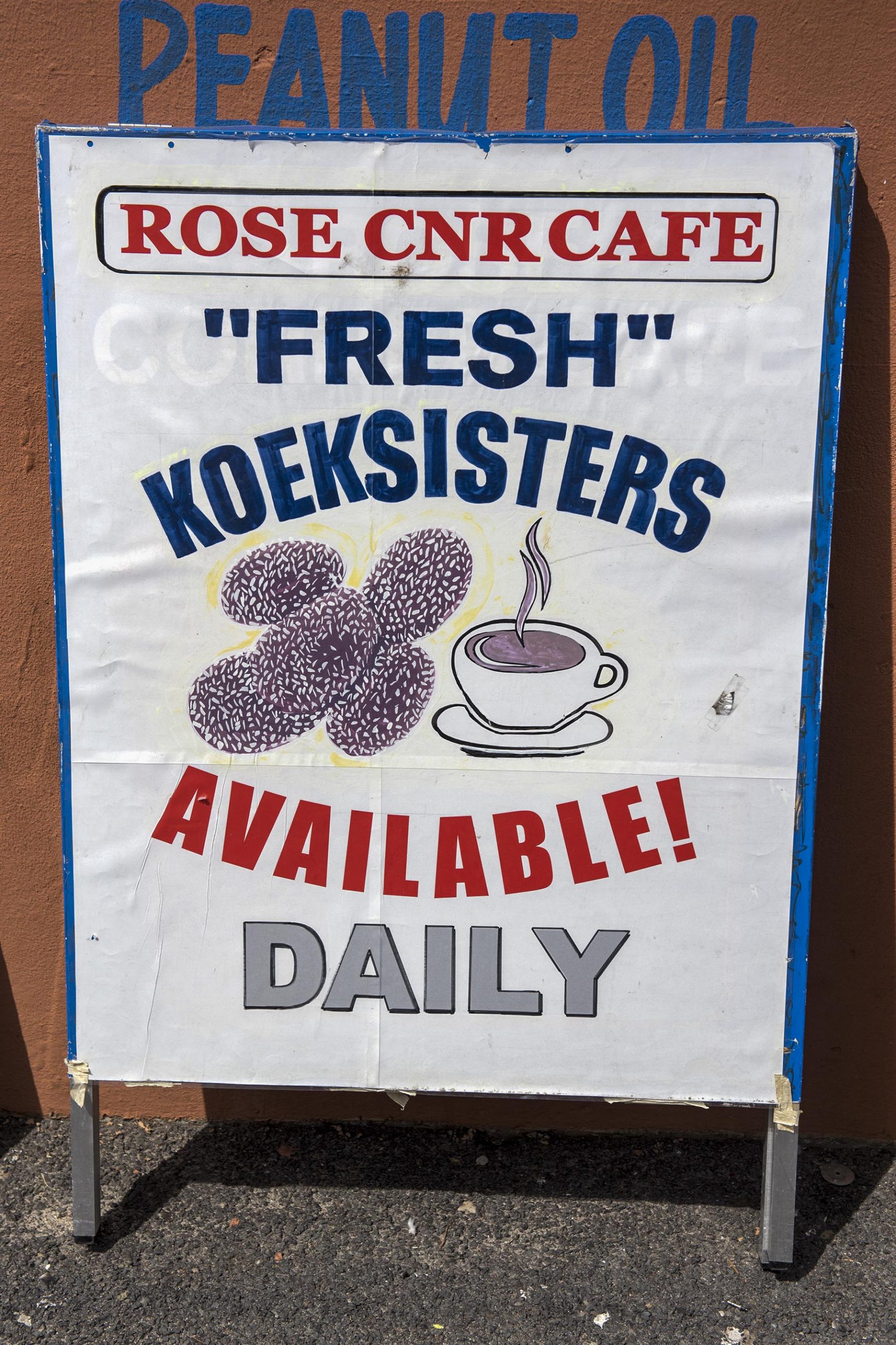 Undated: The sign advertising fresh koe’sisters outside Rose Corner Cafe in the Bo-Kaap, Cape Town. (Photograph by Ishay Govender)