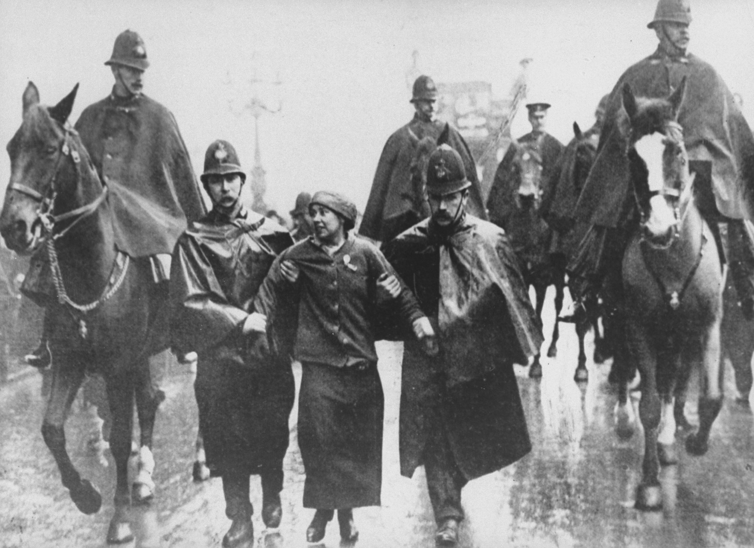 1912: Leading suffragette Sylvia Pankhurst is taken into custody by British police officers during a women's suffrage protest in Trafalgar Square, London, England. In 1829, Robert Peel founded the London Metropolitan Police, the ‘bobbies’ often regarded as the first modern professional police force. (Photograph by Time Life Pictures/ Mansell/ The LIFE Picture Collection via Getty Images)