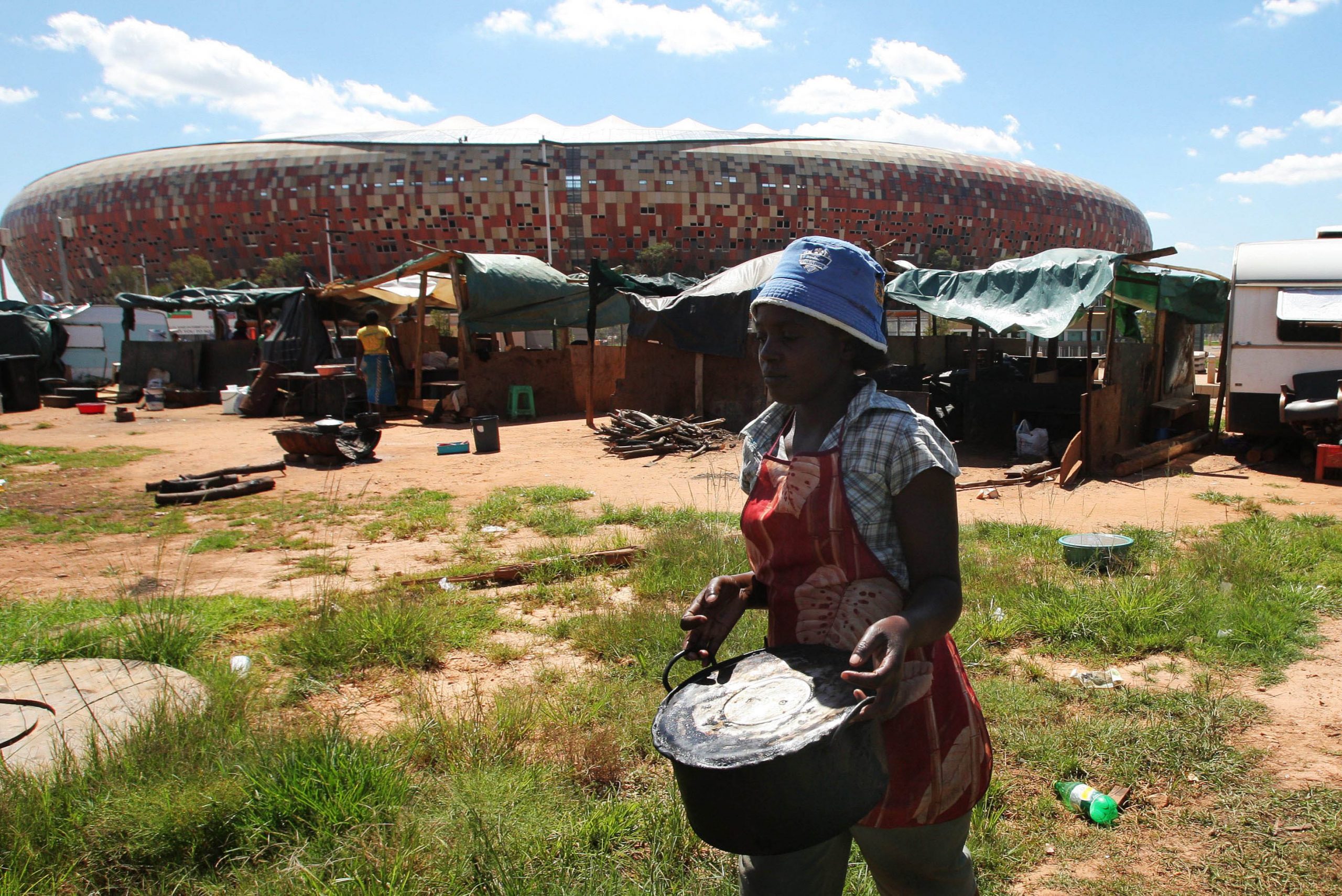 8 March 2010: Food traders outside the Soccer City stadium in Soweto a few months before the start of the 2010 World Cup. They were forced to leave the area in the months leading up to the tournament because of Fifa regulations. (Photograph by Foto24/ Gallo Images/ Getty Images)