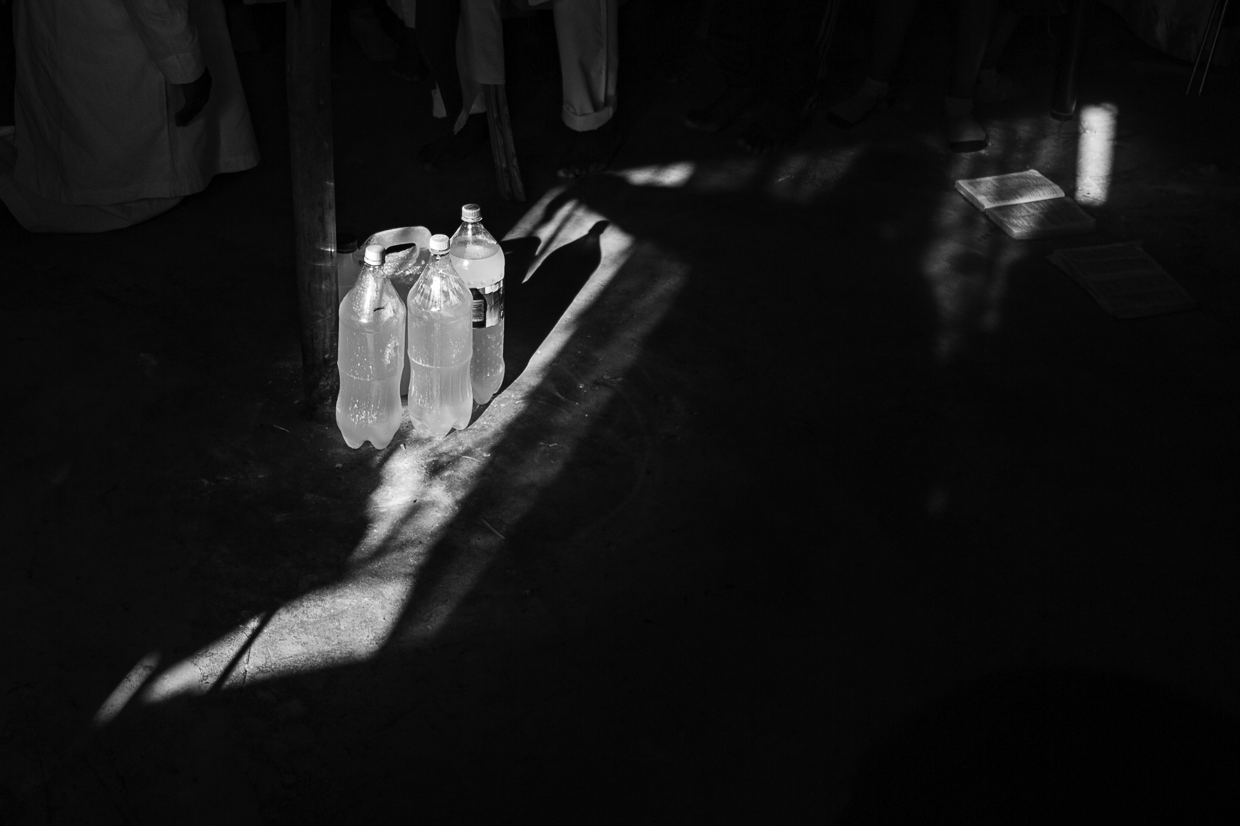 Undated: Iladi – A mixture of water and ash is stored in plastic bottles and placed at sacred spots inside the Nancefield church.