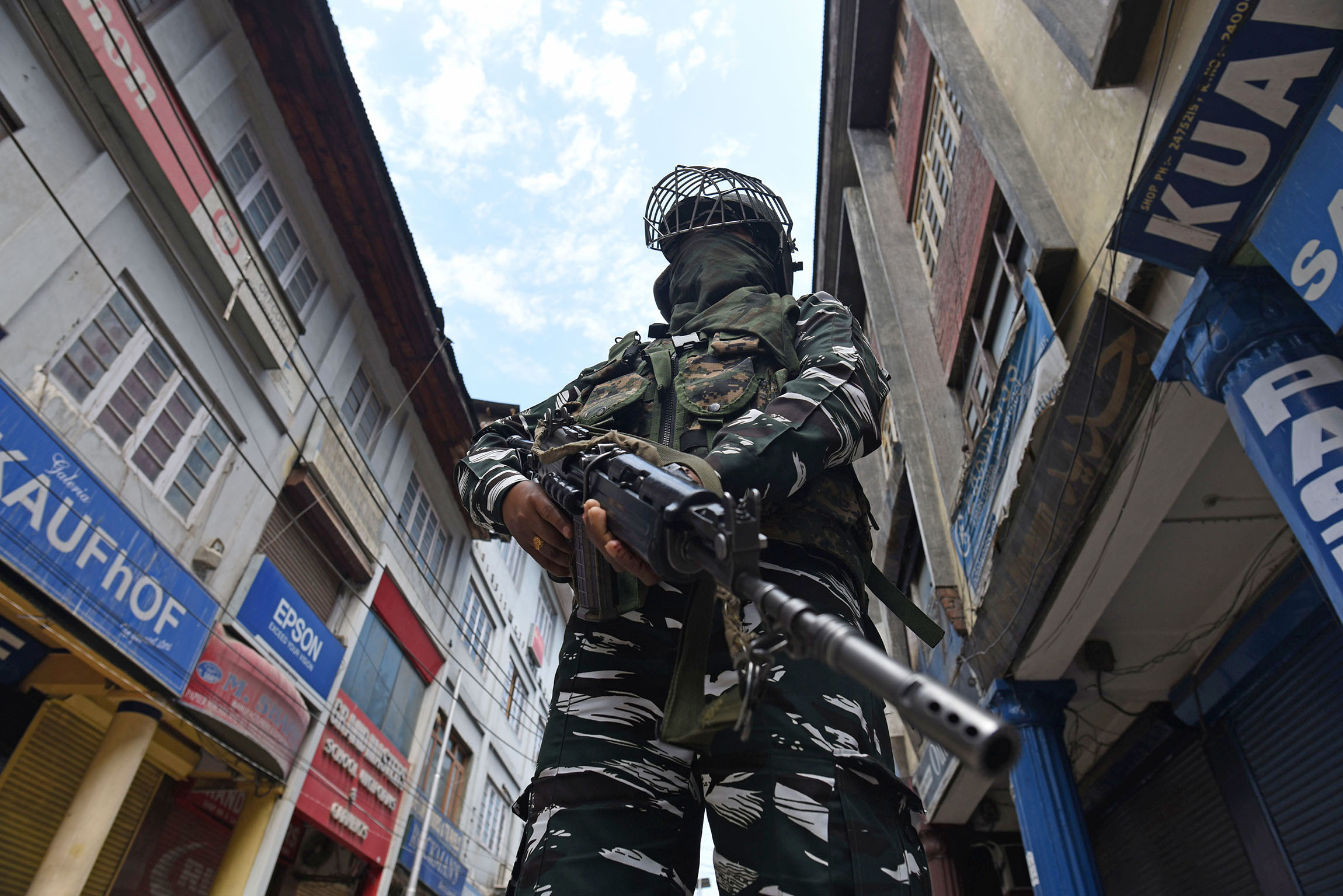 5 August 2020: A paramilitary soldier stands guard in Srinagar on the first anniversary of the abrogation of Article 370, which had guaranteed Jammu and Kashmir a measure of autonomy. (Photograph by Waseem Andrabi/ Hindustan Times via Getty Images)