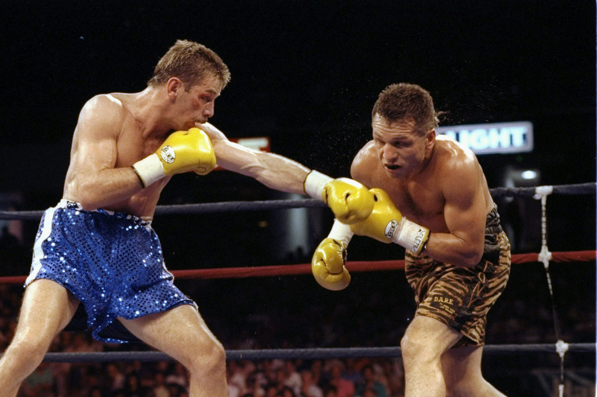 1 January 1993: From left, South African Brian Mitchell and American Tony Lopez in action. (Photograph by Otto Greule/ Allsport/ Getty Images)